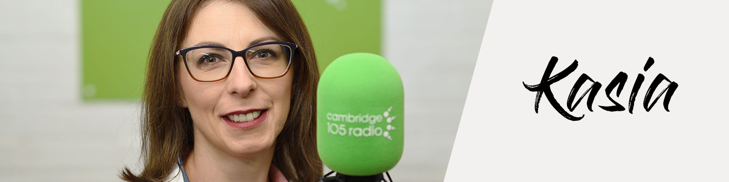 Kasia from Poland in front of a radio microphone