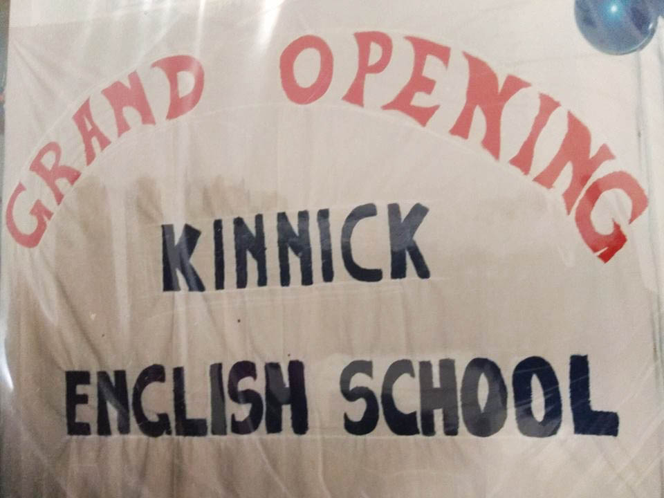The hand-painted sign for Angeliki's English school