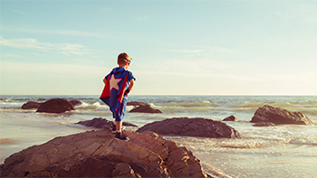 child in a superhero costume