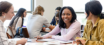 Students studying together in a classroom.