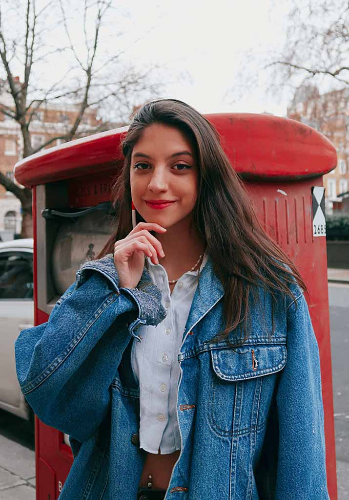 luana wearing denim jacket