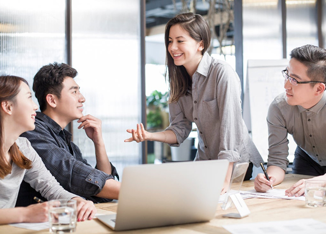 Team collaborating in an office meeting