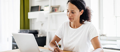 Female teacher holding a tablet