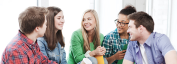 Group of five students speaking English