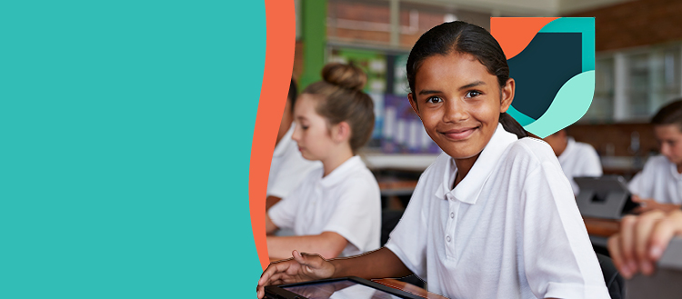 Girl with tablet and shield in classroom.