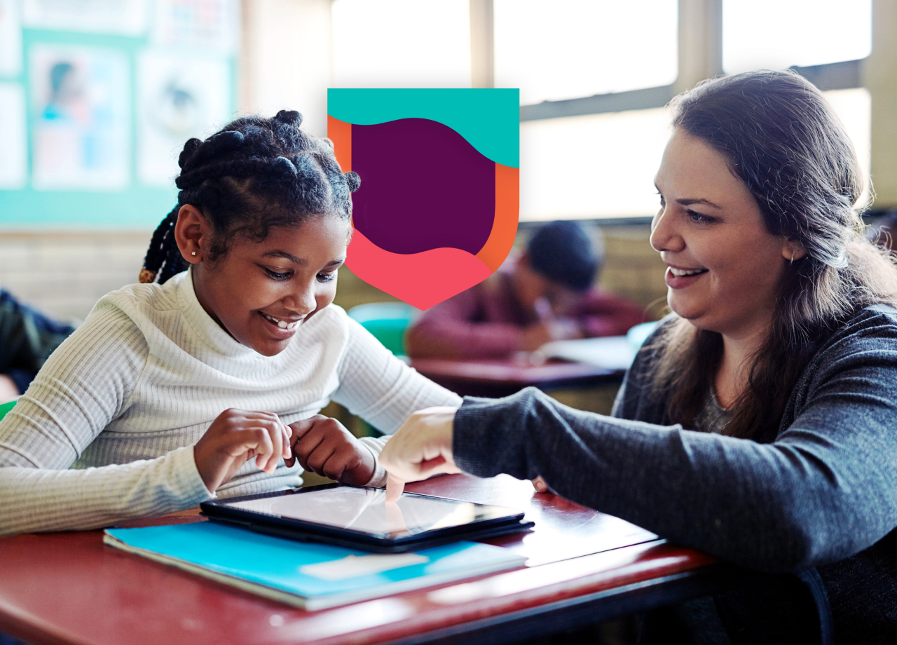 Woman and child using tablet for learning