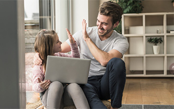 father-and-daughter-celebrating-success